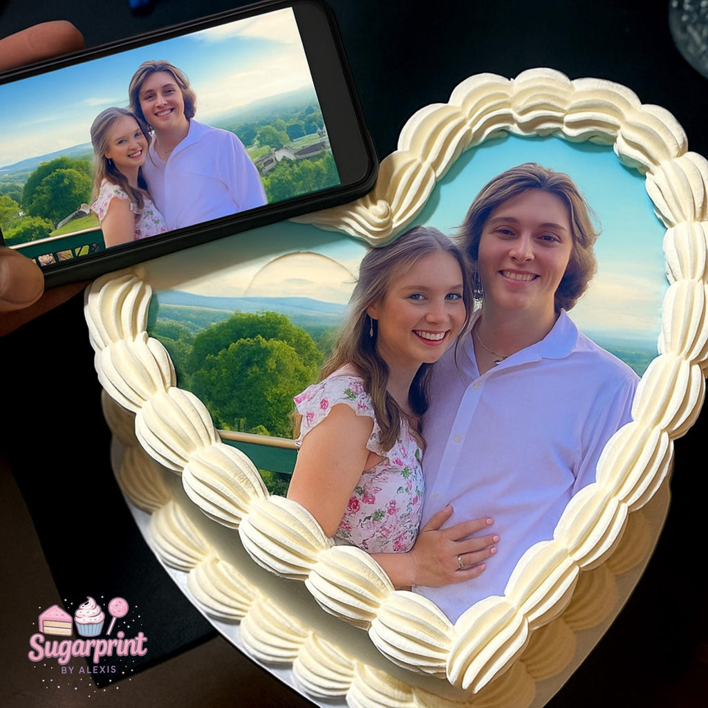 Custom heart photo edible cake topper printed on frosting sheet, ready to place on cake