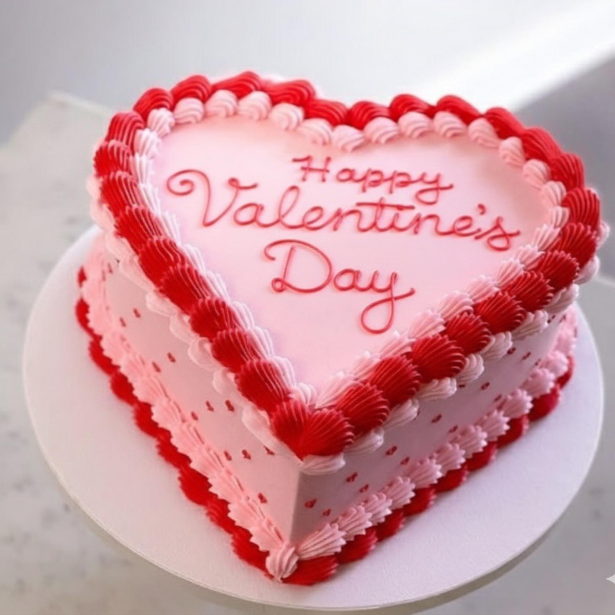 Valentine’s Day edible cake topper printed on icing sheet, featuring a round precut design with “Happy Valentine’s Day” heart-themed artwork. Food-grade edible ink decoration placed on a frosted cake for romantic dessert styling. Smooth buttercream cake surface with edible icing sheet topper applied as a centerpiece for Valentine celebration, anniversary, or love-themed party dessert. Packaged edible cake image suitable for easy peel-and-place use