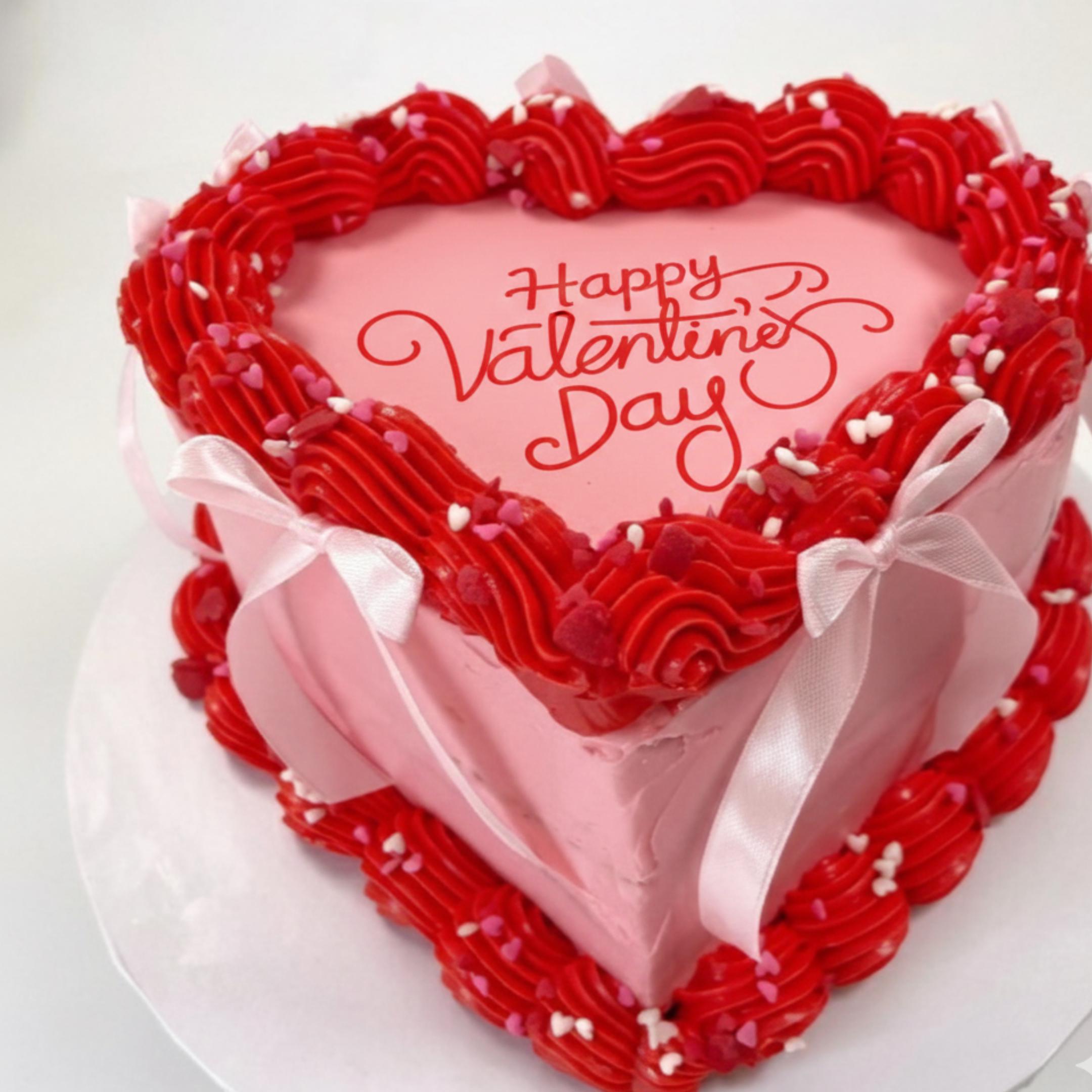 Happy Valentine’s Day red script round edible icing topper on white background.