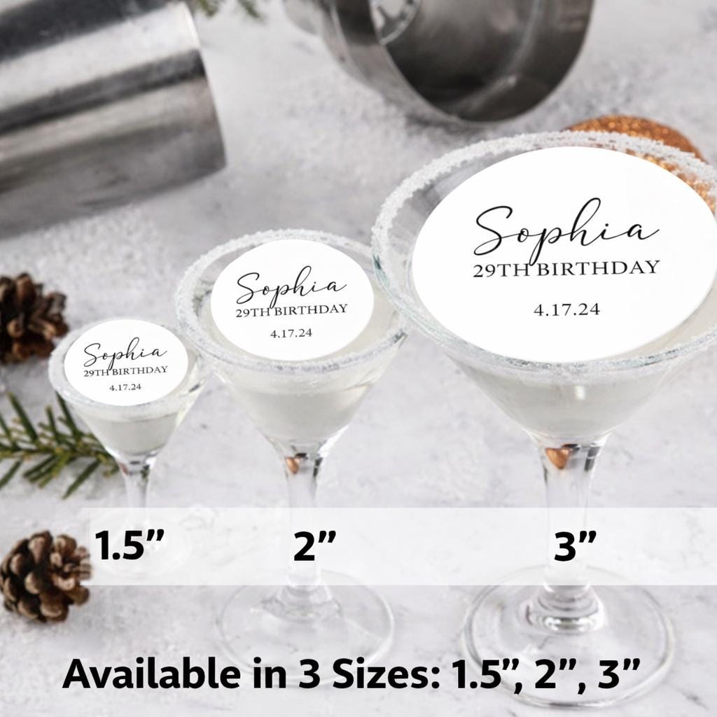Custom Cocktail Toppers Cocktail glasses filled with liquid that have three different size custom birthday wedding baby shower bridal shower holiday cocktail toppers that are available in 1.5 inches, 2 inches, 3 inches.
