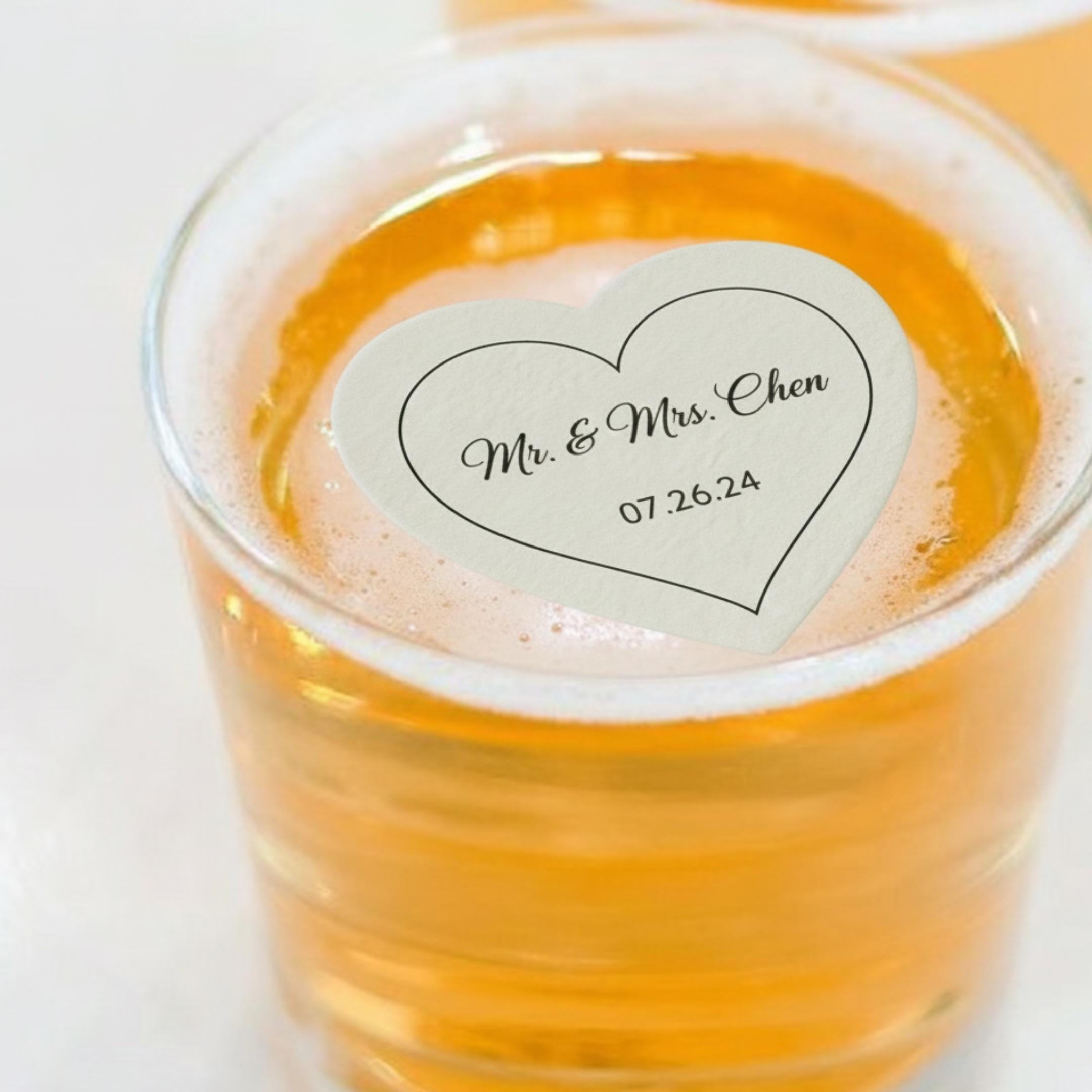 Wedding edible drink toppers made from wafer paper in heart and circle shapes, designed for floating on cocktails, signature drinks, and party beverages. Printed with food-safe edible ink, these decorative toppers add a romantic and elegant touch to wedding celebrations, receptions, and bridal events. Precut and easy to use, they enhance drink presentation with a soft floating effect, making each beverage look stylish, personalized, and photo-ready for special occasions