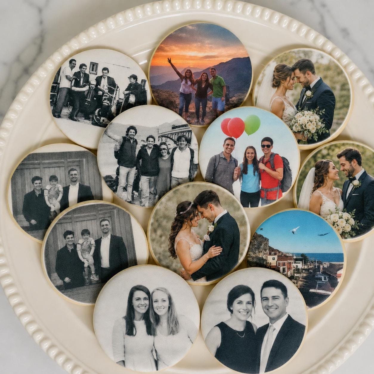Custom edible photo cookies displayed on a white serving plate, featuring personalized wedding photos, family portraits, travel memories, and vintage images printed on round sugar cookies. These custom wedding photo cookies make elegant dessert decorations for weddings, bridal showers, anniversaries, rehearsal dinners, and engagement parties.