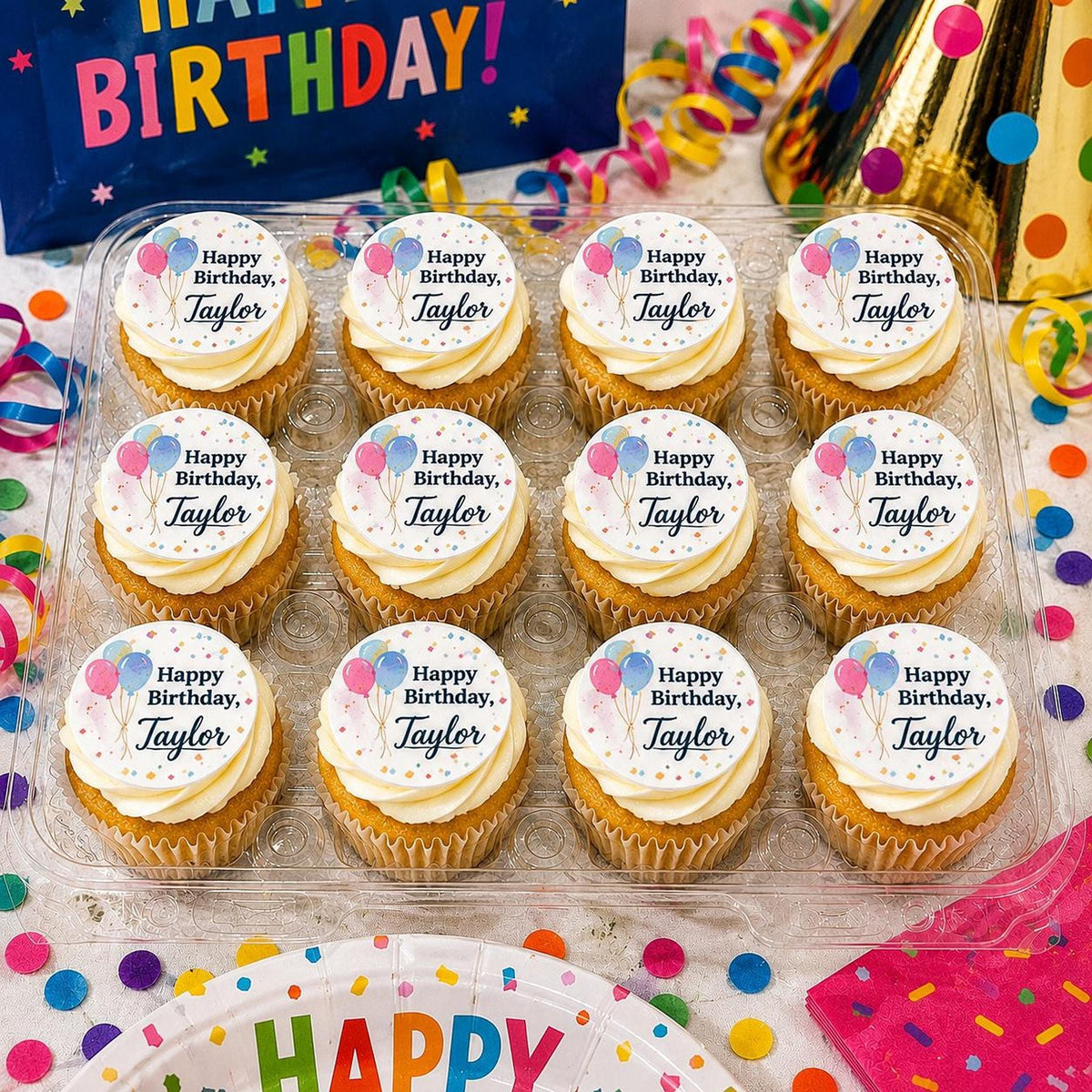 Edible icing sheet cupcake topper with custom photo design from SugarPrints by Alexis on a decorated cupcake.