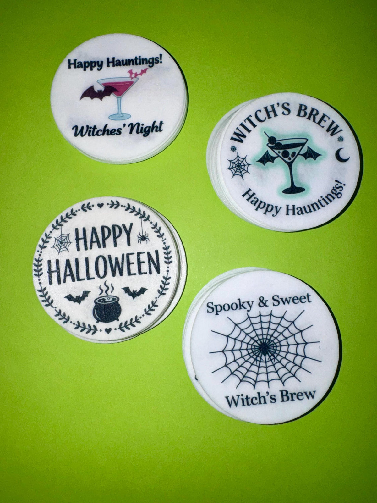 Halloween edible drink toppers by SugarPrints, wafer paper cocktail decorations floating in a glass for spooky drinks.