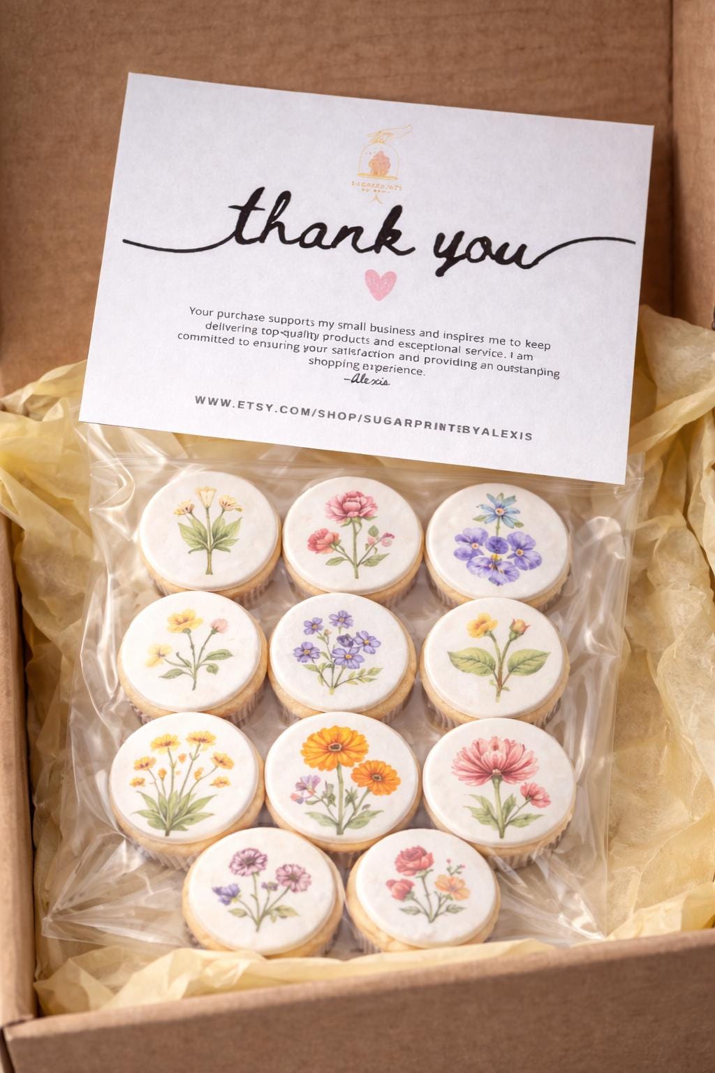 Birth month flower cupcake topper by SugarPrints by Alexis on edible wafer paper or icing sheet, featuring colorful floral designs.