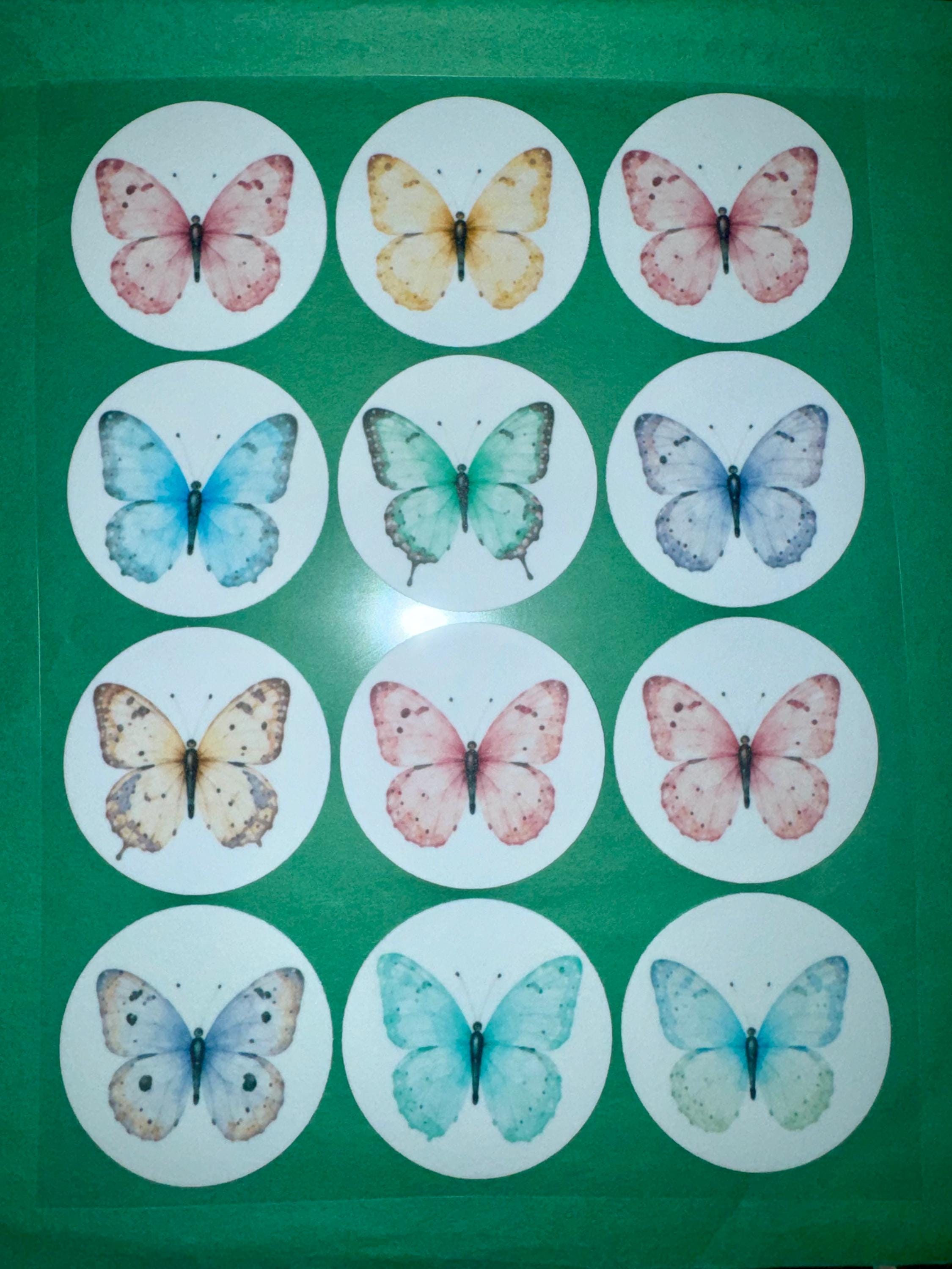 Set of 12 Butterfly Garden Party cupcake toppers made of edible wafer paper by SugarPrints by Alexis, perfect for decorating cupcakes.