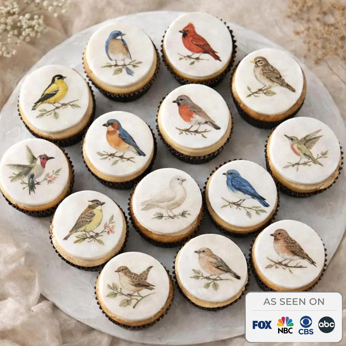 Set of 12 vintage botanical bird cupcake toppers made from edible watercolor wafer paper, perfect for decorating cupcakes.