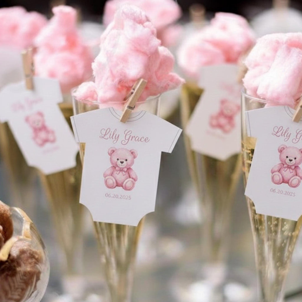 Baby shower edible drink toppers in cute onesie shape made from wafer paper, designed to float on coffee, milk foam, mocktails, and party drinks. These precut toppers are printed with food-safe edible ink, adding a soft and charming touch to baby shower, gender reveal, and welcome baby celebrations. Perfect for themed party decor, they create a stylish and photo-ready presentation while enhancing the overall event setup