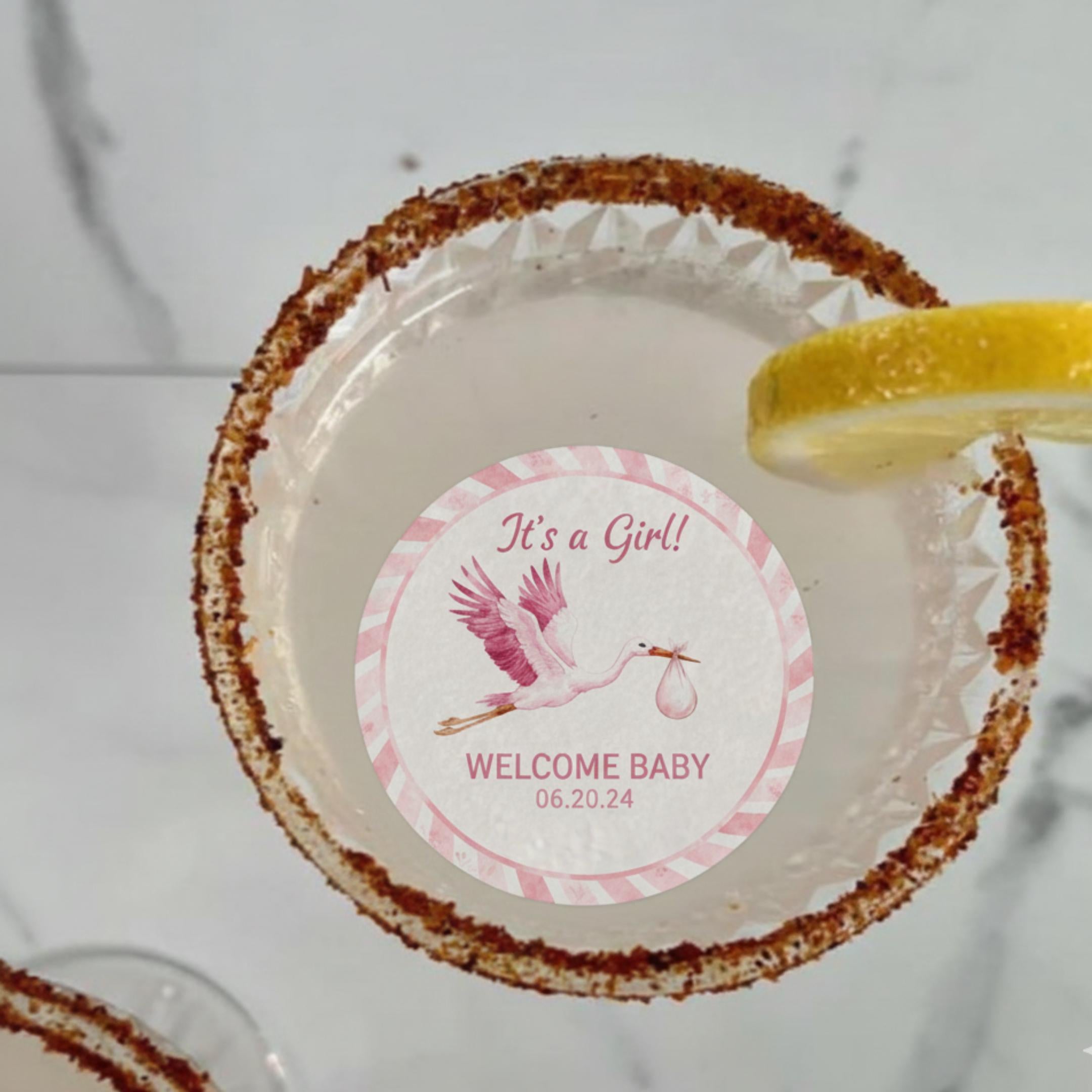 Baby shower edible cocktail topper with stork art, floating wafer circle