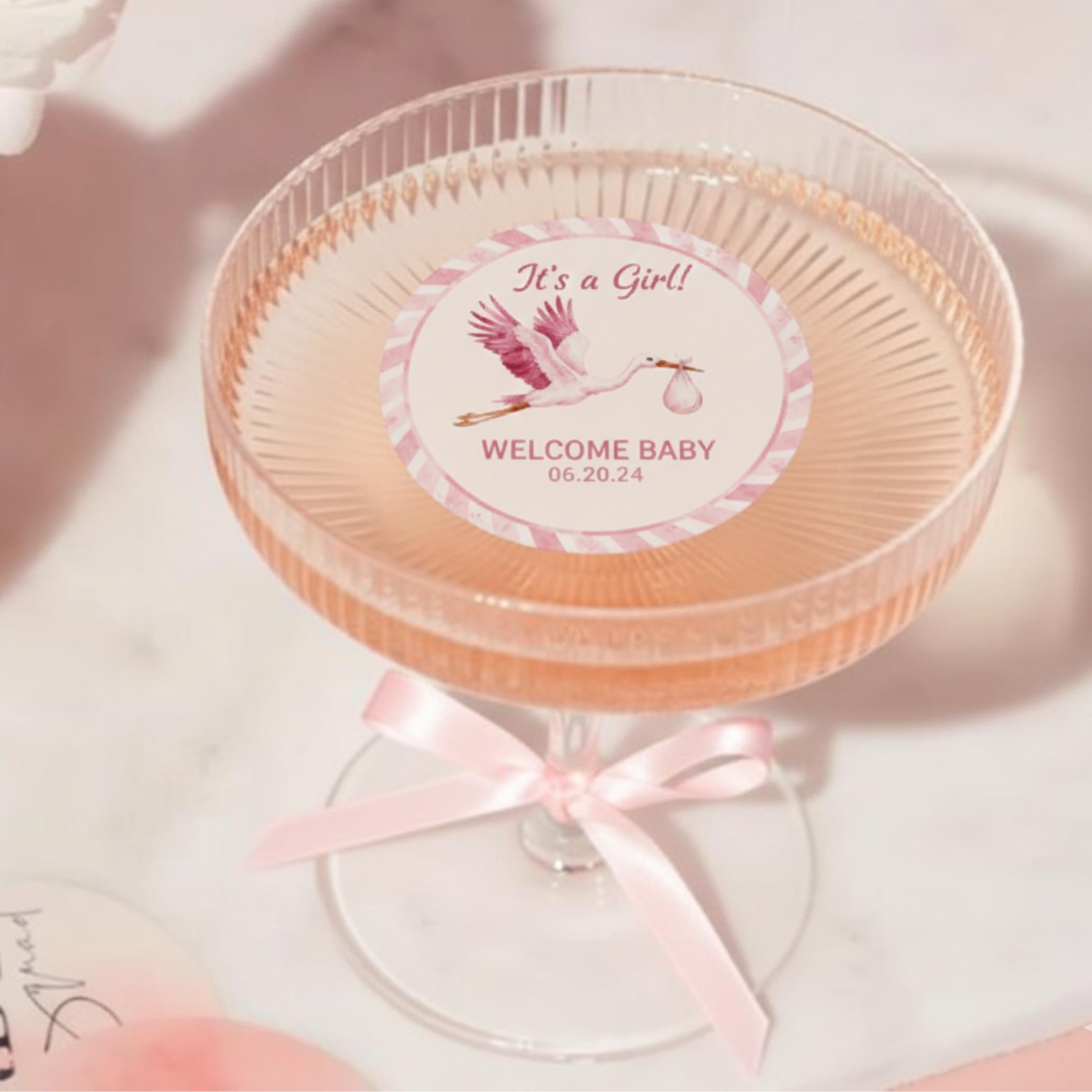 Baby shower edible cocktail topper with stork art, floating wafer circle