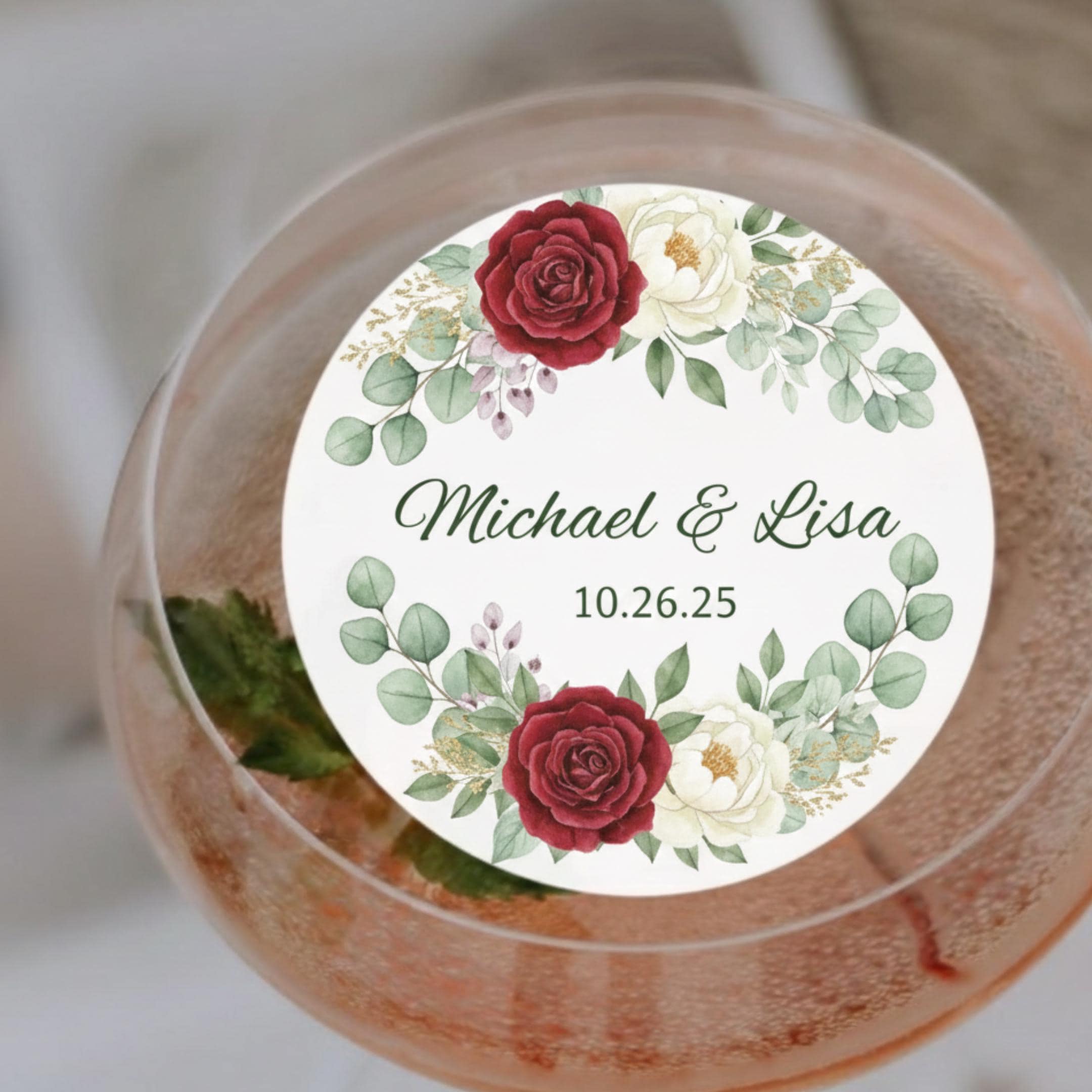 Floral wedding drink topper by SugarPrints by Alexis, edible wafer paper circle with names and date for signature cocktails.