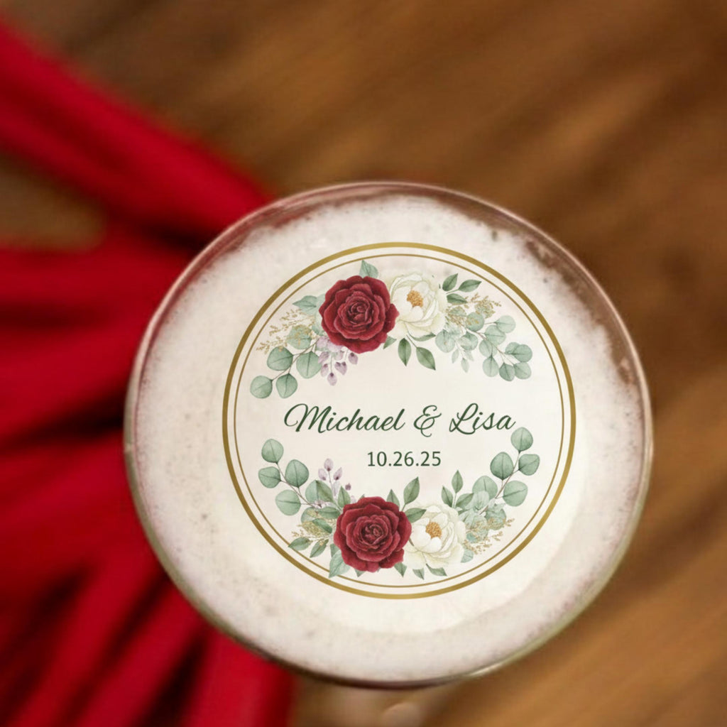Floral wedding drink toppers by SugarPrints, edible wafer paper circles with names and date for signature cocktails.