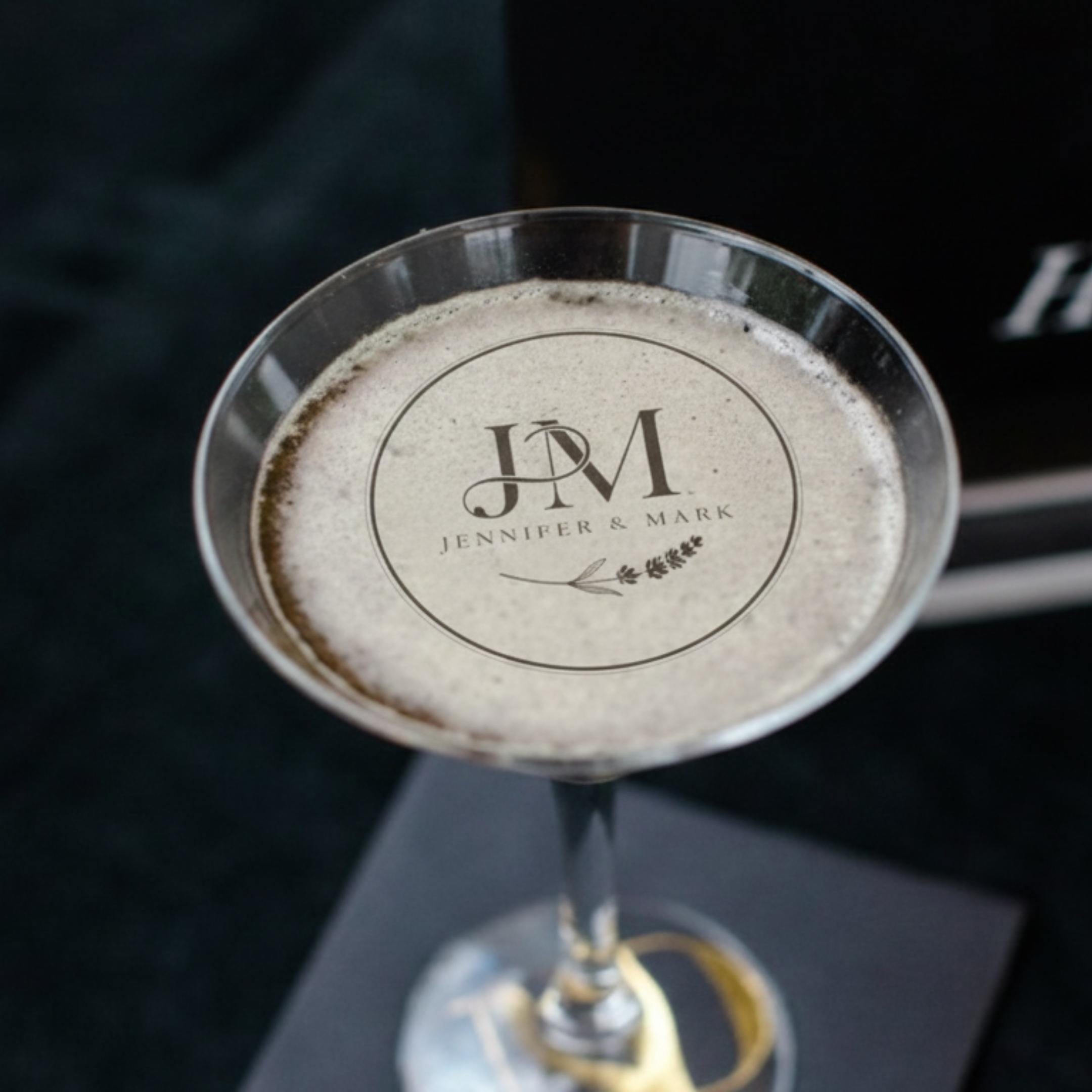 Personalized wedding drink topper with custom initials on edible wafer paper, perfect for cocktail decorations.