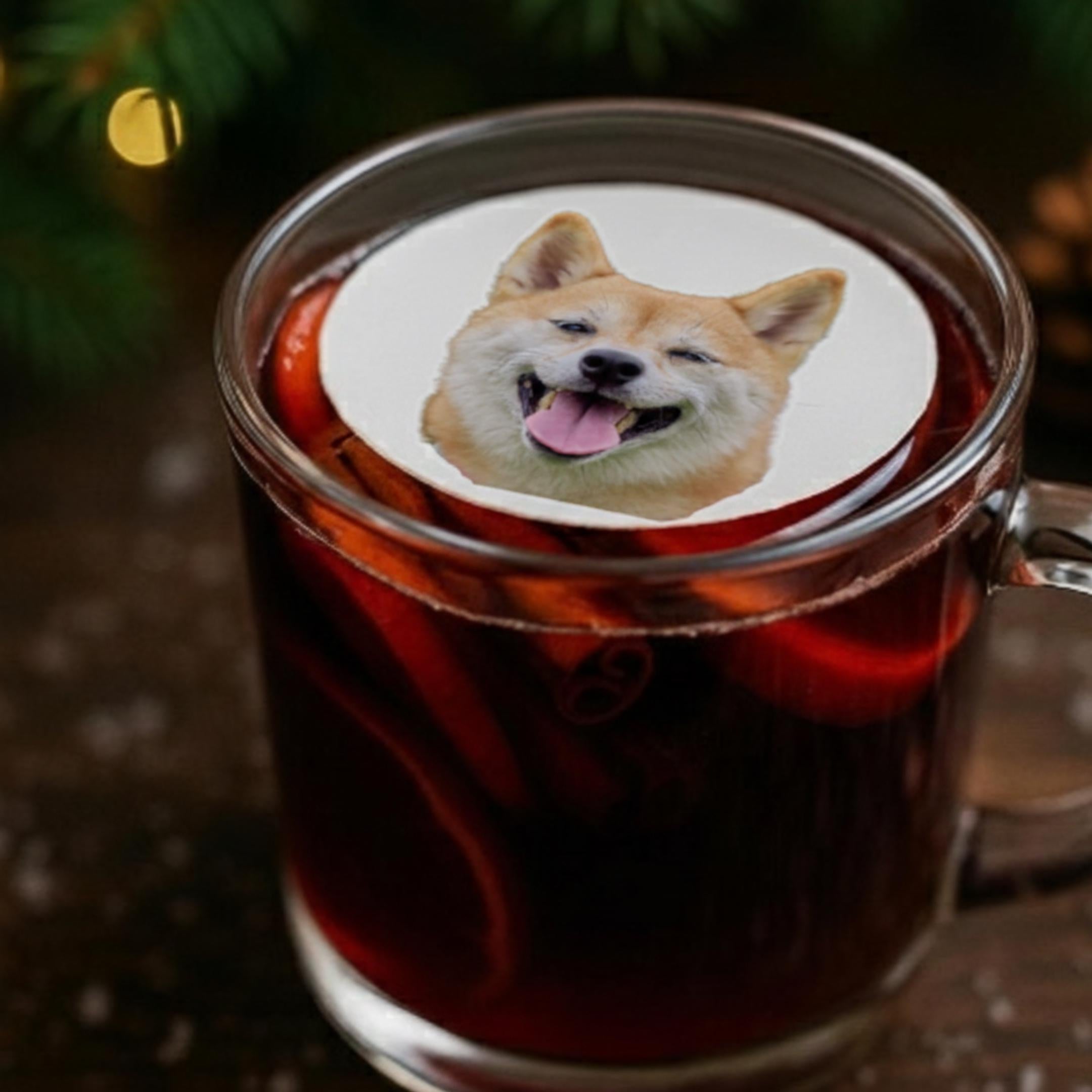 Edible wafer paper drink toppers cut to a pet silhouette floating on a latte.